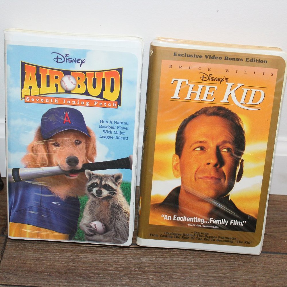 2 Disney VHS Tape Movies - Air Bud / The Kid